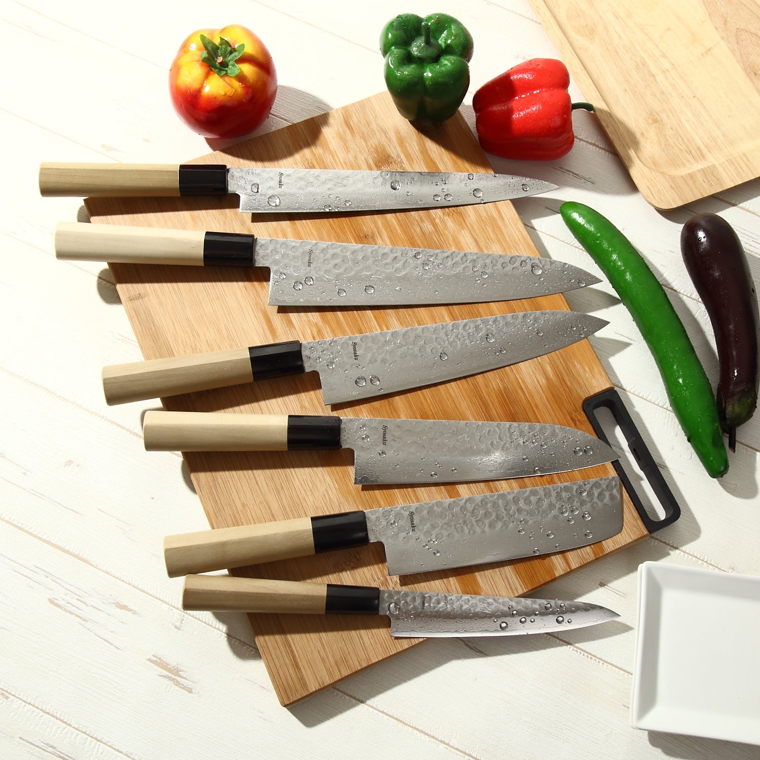 Syosaku Japanese Multi-Purpose Chef Knife Hammered Damascus VG-10 46 Layer D-Shape Magnolia Wood Handle, Santoku 7-inch (180mm)